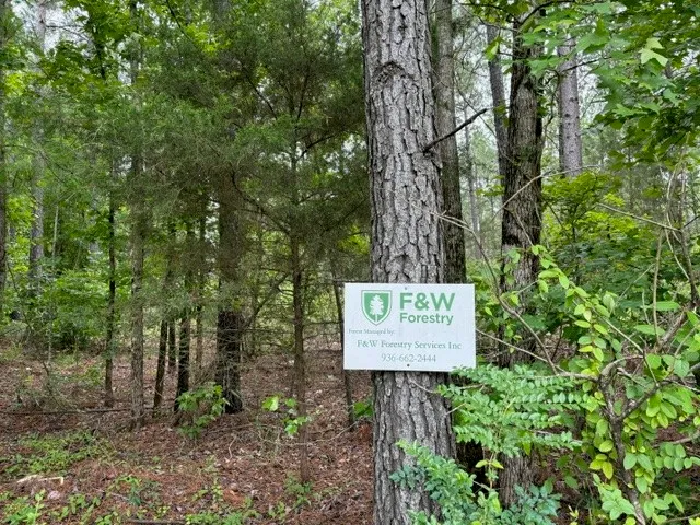 a sign on the side of the road