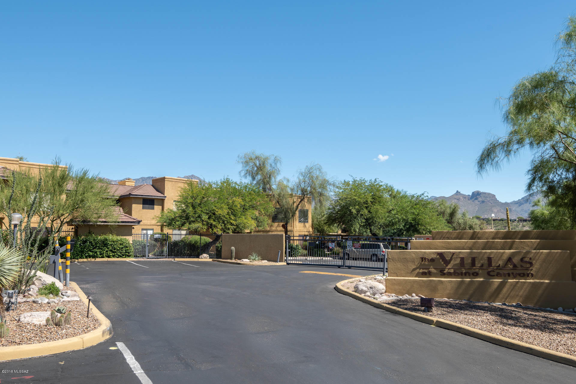 7255 East Snyder Road, Unit 8205 Tucson, AZ 85750 - Photo 22 of 23 a view of a street with a building in the background