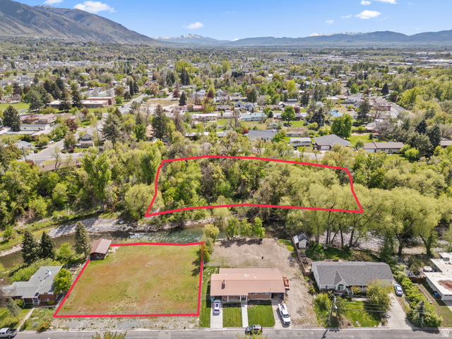 472 East 300 South Logan, UT 84321 - Photo 3 of 9 Expansive aerial perspective showcasing multiple parcels of land