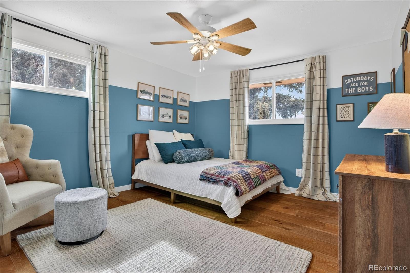 5915 South Birch Way Centennial, CO 80121 - Photo 12 of 22 a bedroom with bed and a couch