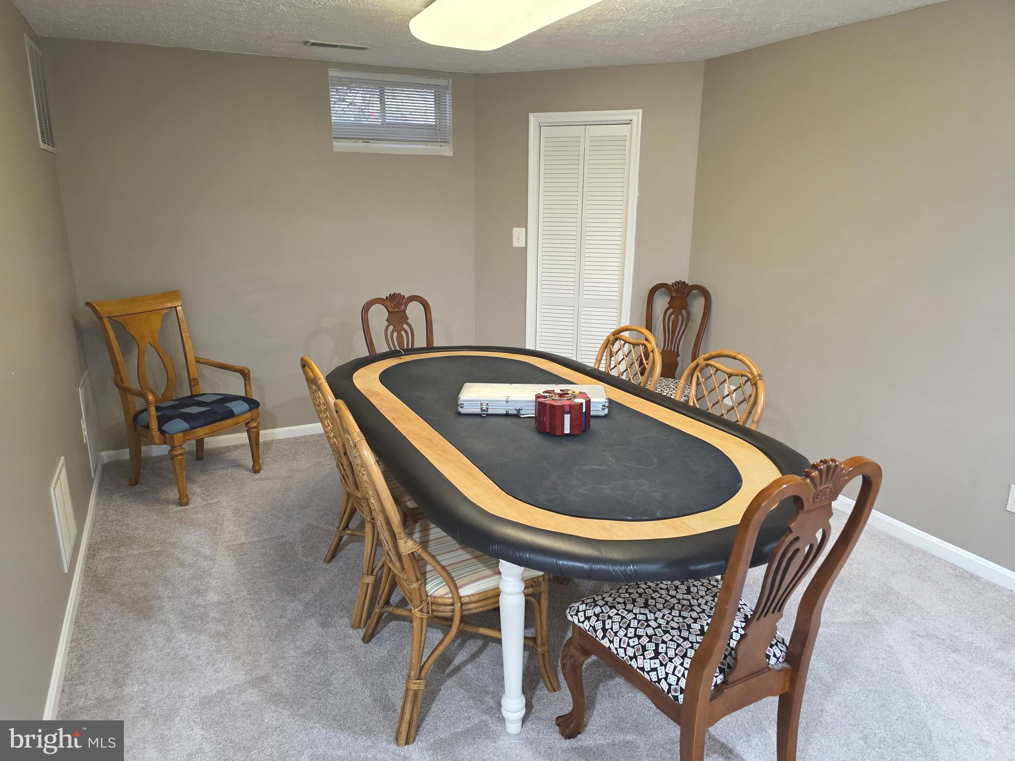 2441 Kemper Road Crofton, MD 21114 - Photo 57 of 63 a table and chairs in a room