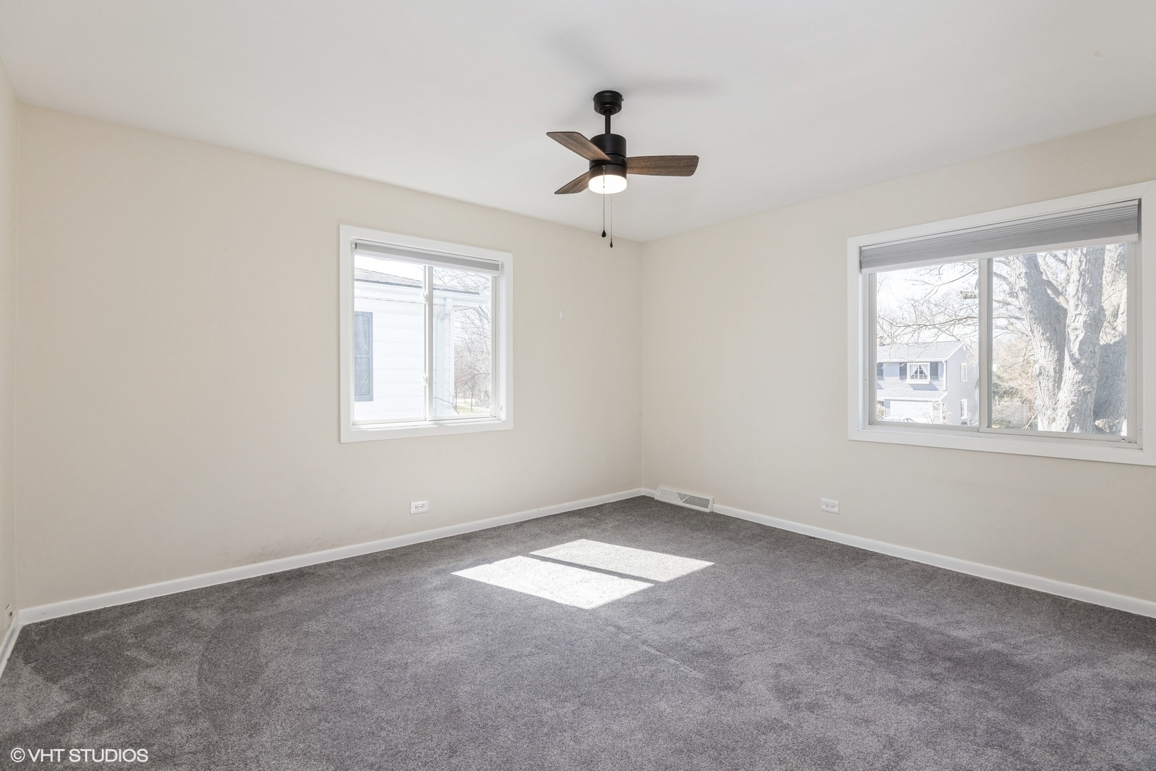 127 Riverside Drive Northfield, IL 60093 - Photo 13 of 27 an empty room with windows and fan
