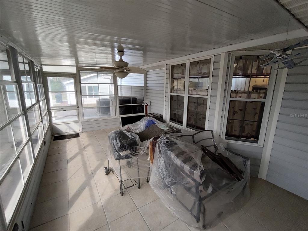 8274 Southwest 116th Street Ocala, FL 34481 - Photo 25 of 30 a living room with furniture