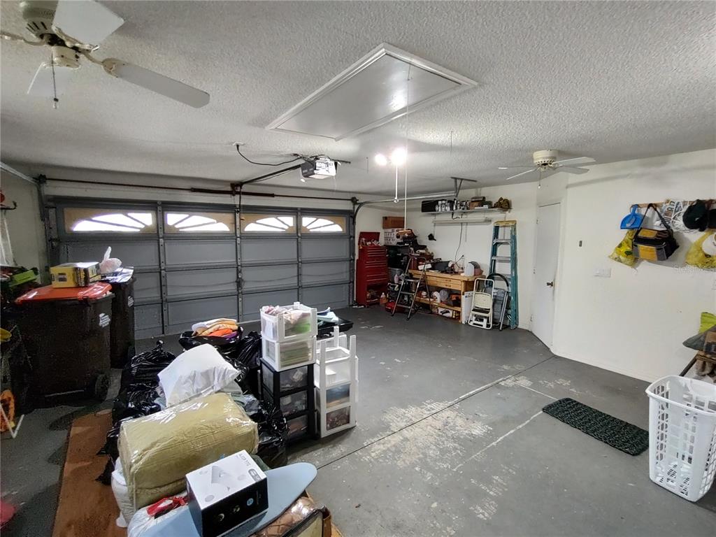 8274 Southwest 116th Street Ocala, FL 34481 - Photo 30 of 30 a room with furniture and a large window