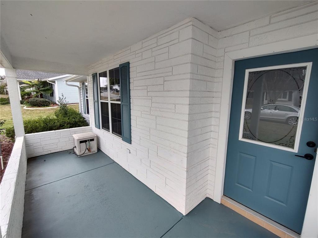 8274 Southwest 116th Street Ocala, FL 34481 - Photo 4 of 30 a view of a car in front of a house