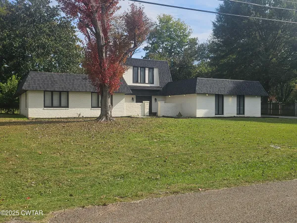 a house view with a garden space