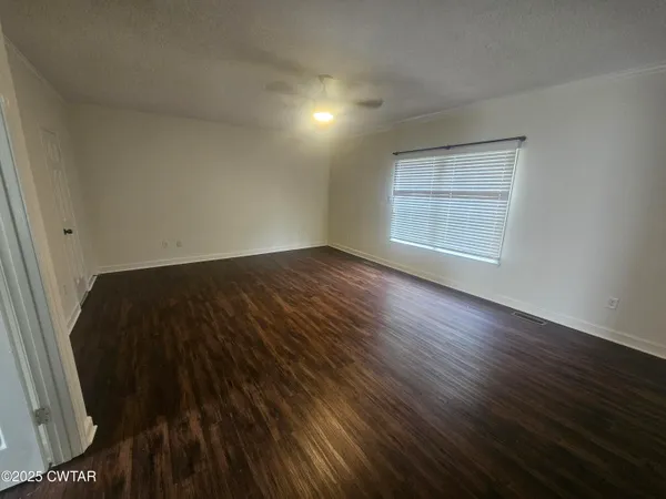 a bathroom with a double vanity sink toilet and shower