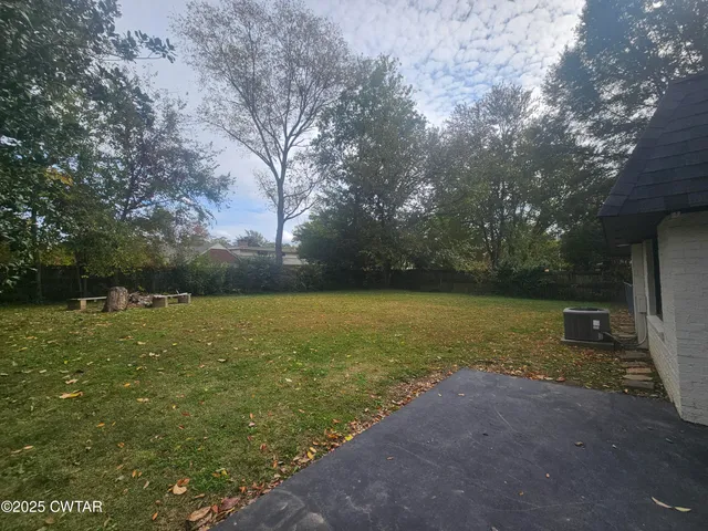 a view of outdoor space and yard