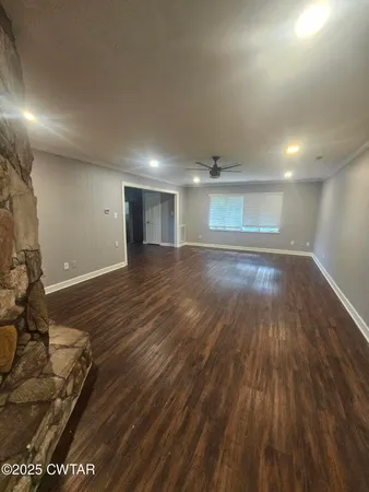 a view of entryway with wooden floor