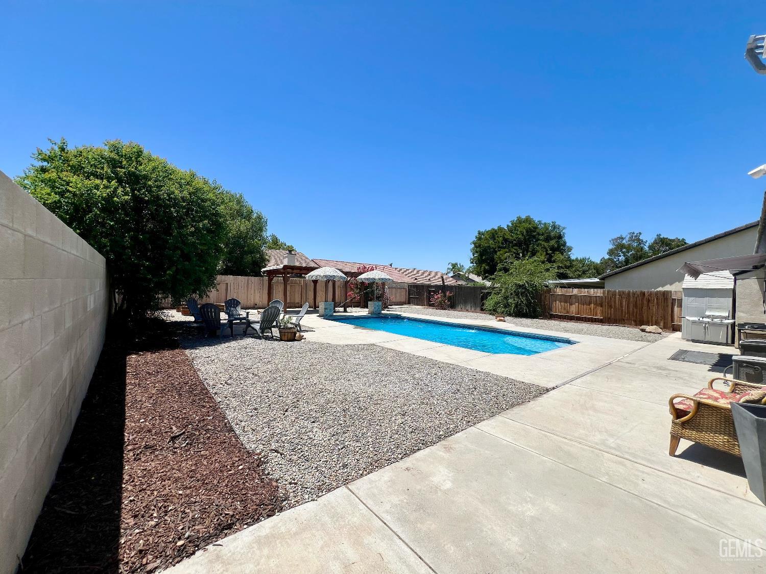 Undisclosed Address Bakersfield, CA 93312 - Photo 25 of 26 a view of a backyard with sitting area