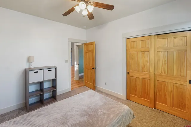 a view of a bedroom with closet area