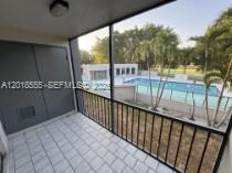 8445 Springtree Drive, Unit 207A Sunrise, FL 33351 - Photo 8 of 11 a view of a balcony