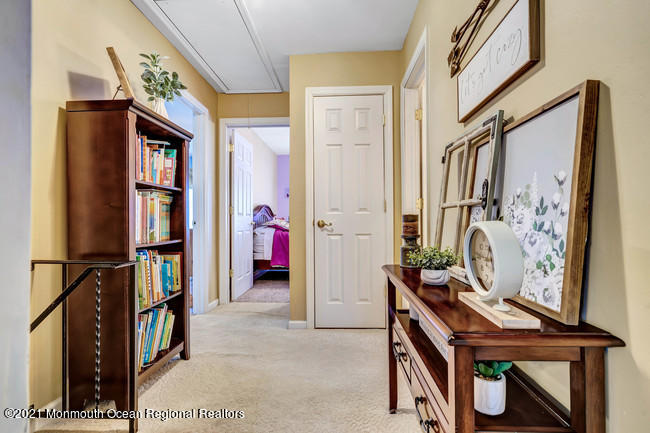 39 Kingsley Way Freehold, NJ 07728 - Photo 14 of 24 a view of an entryway with furniture