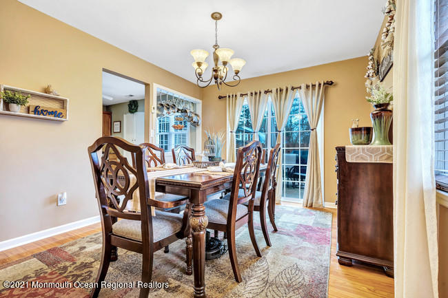 39 Kingsley Way Freehold, NJ 07728 - Photo 5 of 24 a view of a dining room with furniture window and wooden floor