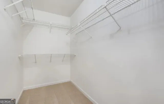 a view of a room with racks on the wall