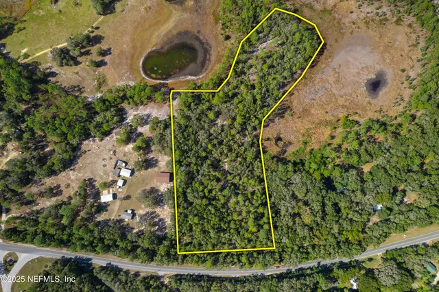 a view of a yard with an outdoor space