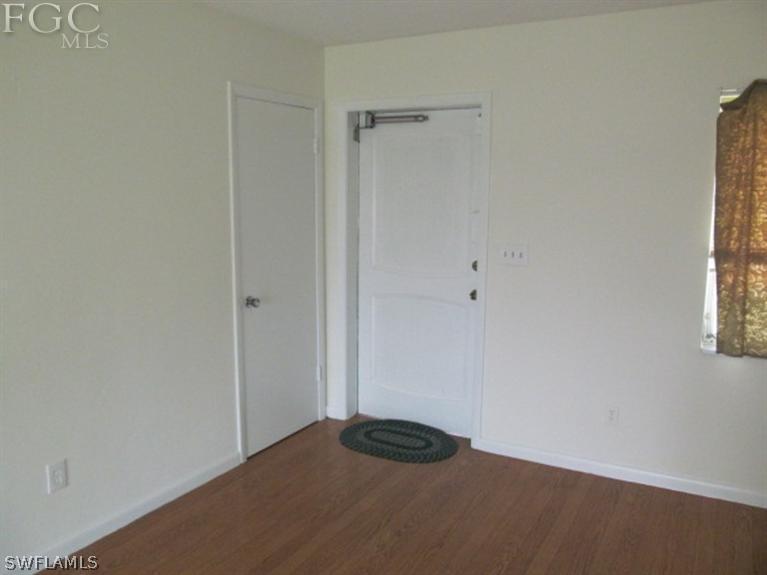 106 Georgia Road Lehigh Acres, FL 33936 - Photo 3 of 14 a view of an empty room