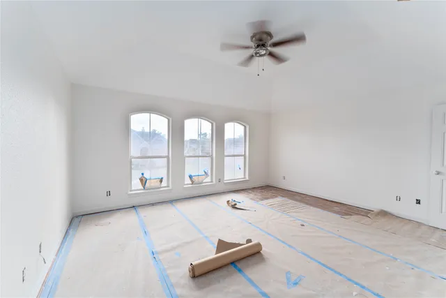 an empty room with windows