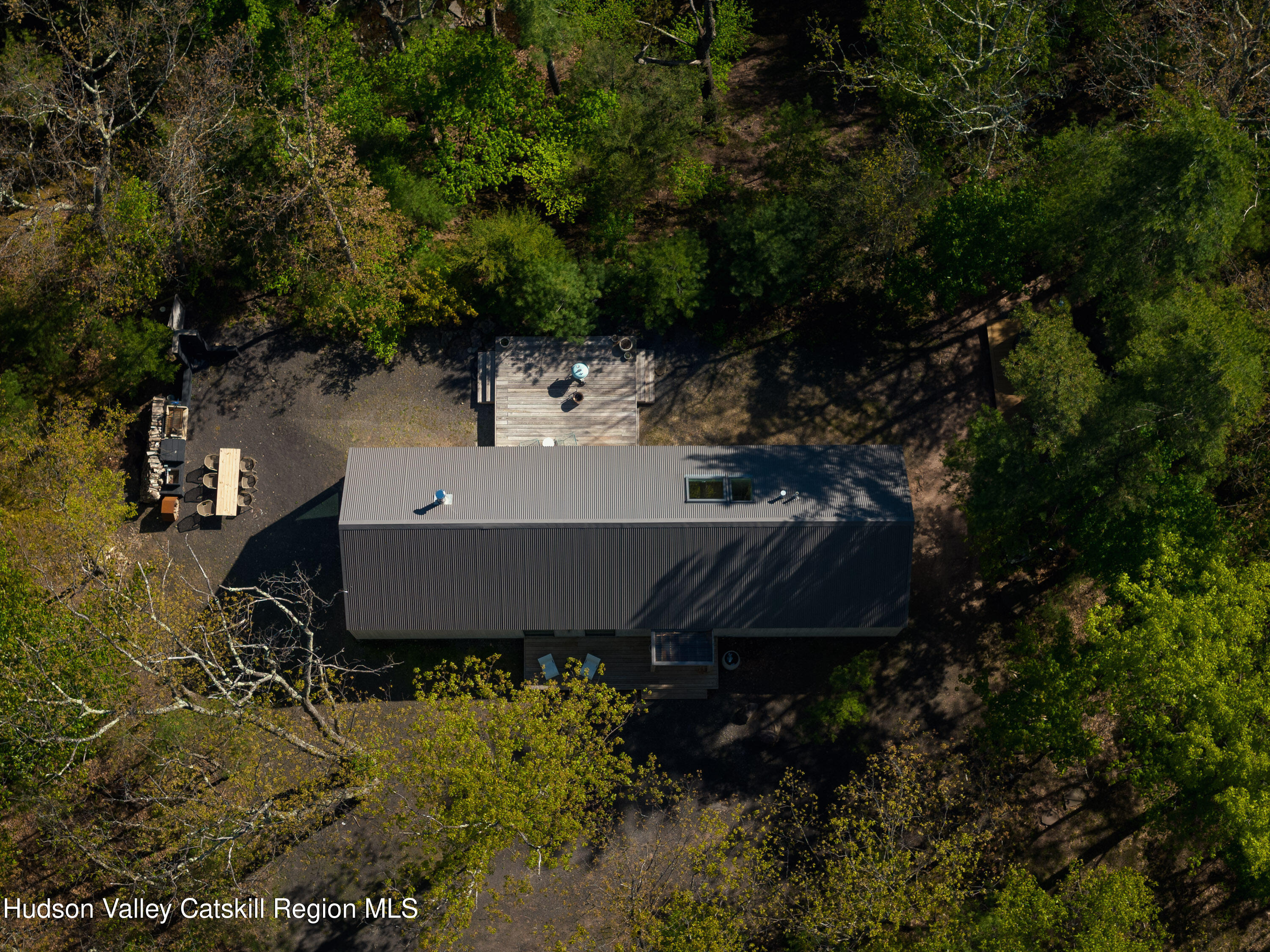261 Blackhead Mountain Road Round Top, NY 12473 - Photo 37 of 40 an aerial view of a house with a yard and garden