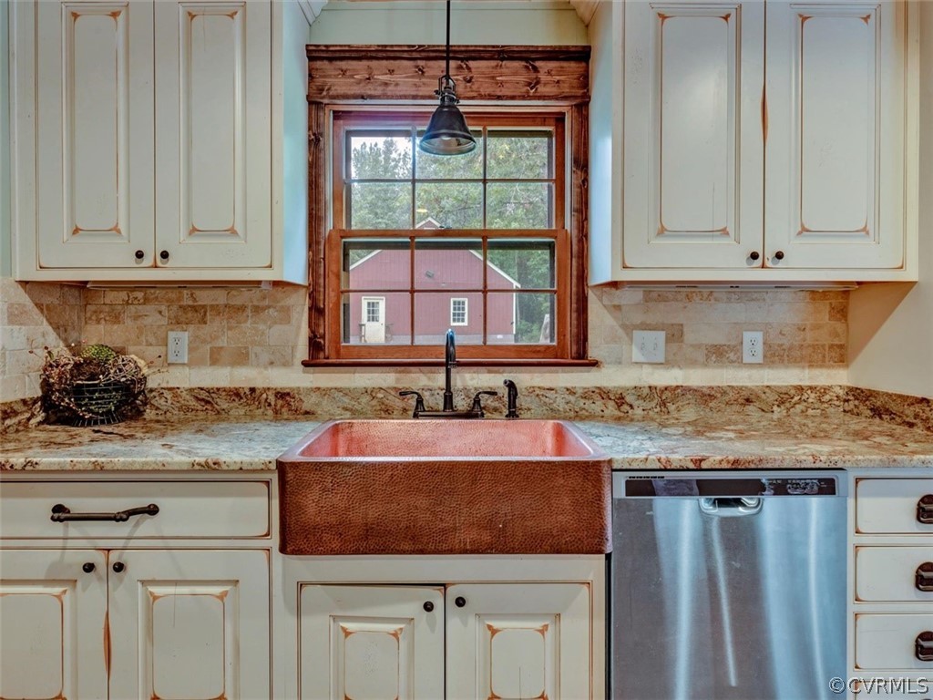 5900 Moseley Road Moseley, VA 23120 - Photo 14 of 45 a kitchen with granite countertop a sink and cabinets