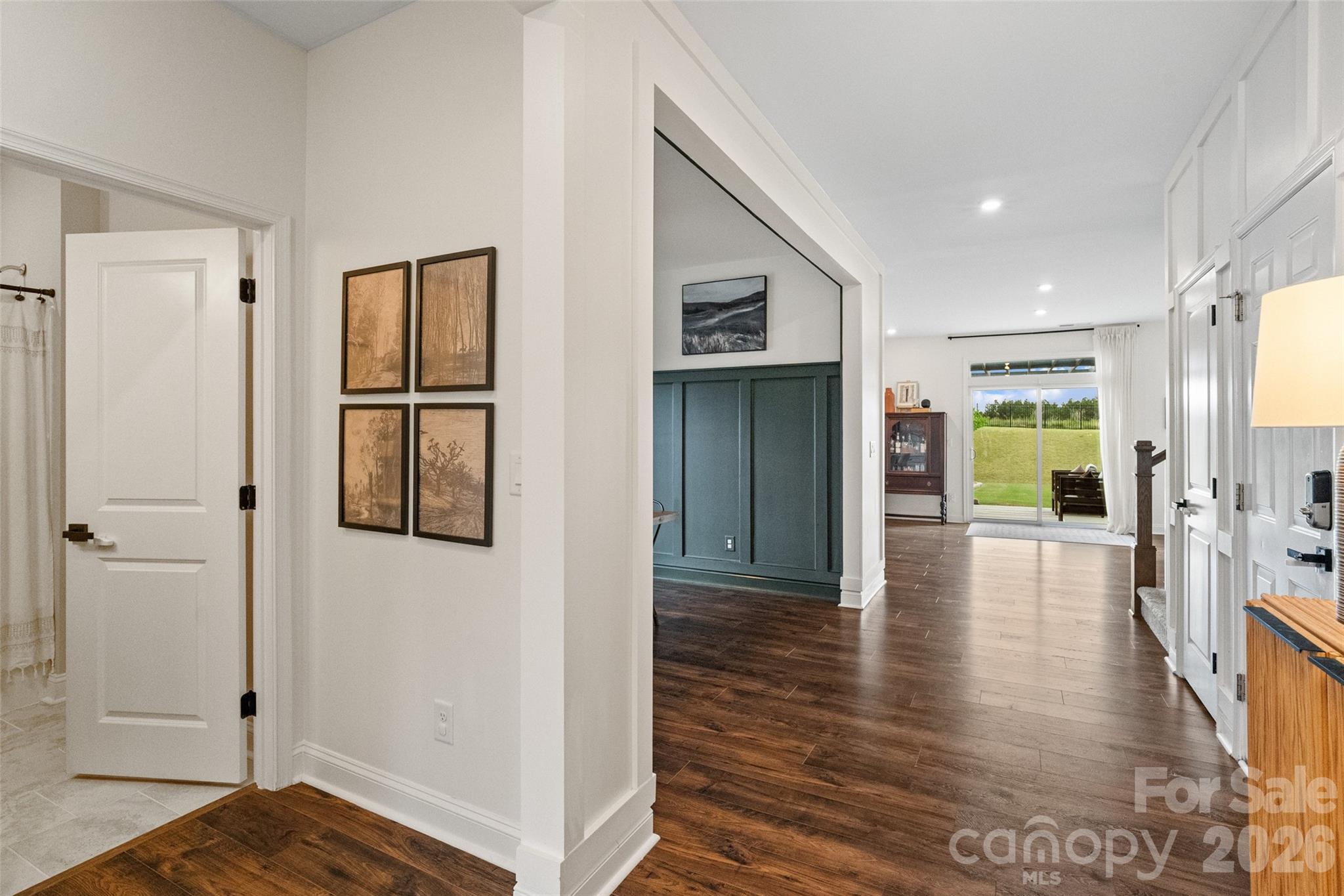 1350 Fishing Creek Road Clover, SC 29710 - Photo 8 of 47 a view of a hallway with wooden floor windows and livingroom