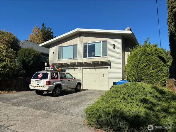 a car parked in front of a house