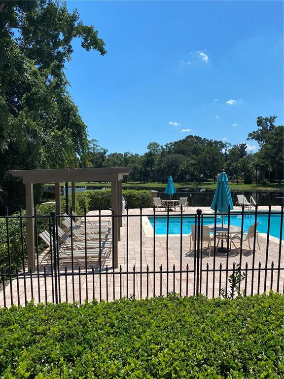 404 Summit Ridge Place, Unit 302 Longwood, FL 32779 - Photo 10 of 13 a view of a garden