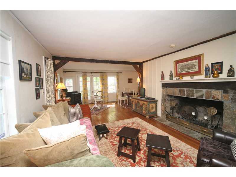 141 West Norwalk Road West Norwalk, CT 06850 - Photo 14 of 24 a living room with furniture and a fireplace