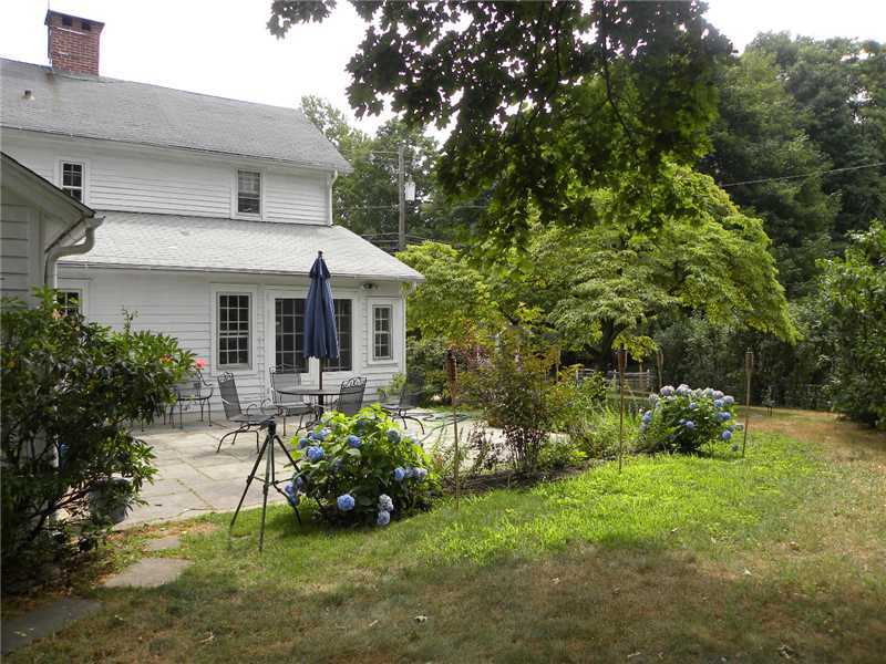 141 West Norwalk Road West Norwalk, CT 06850 - Photo 2 of 24 a front view of a house with garden