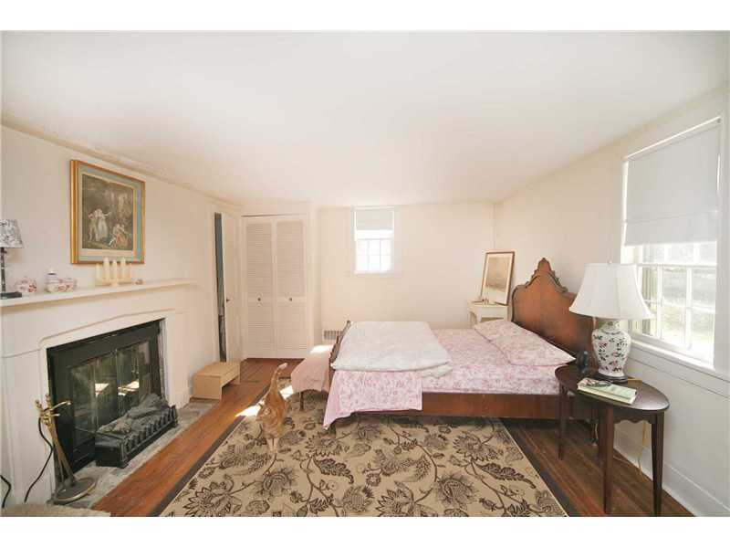 141 West Norwalk Road West Norwalk, CT 06850 - Photo 23 of 24 a living room with furniture and a fireplace
