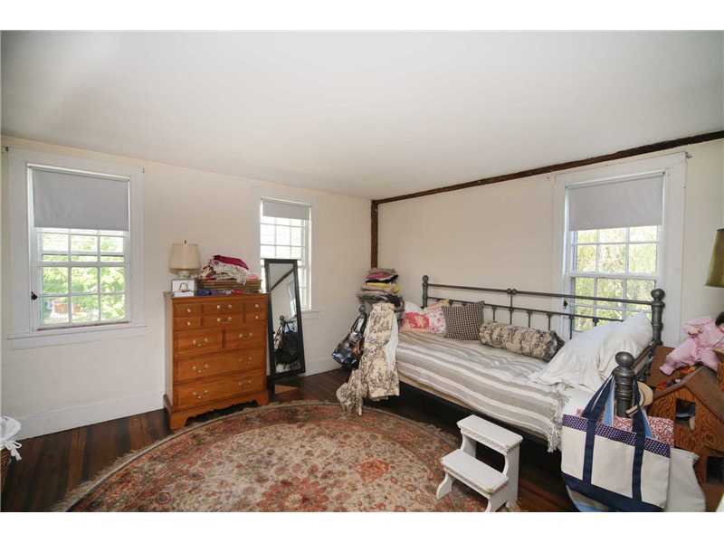 141 West Norwalk Road West Norwalk, CT 06850 - Photo 24 of 24 a bedroom with furniture and a window