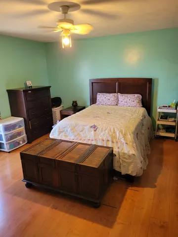 a bathroom with a tub and a shower