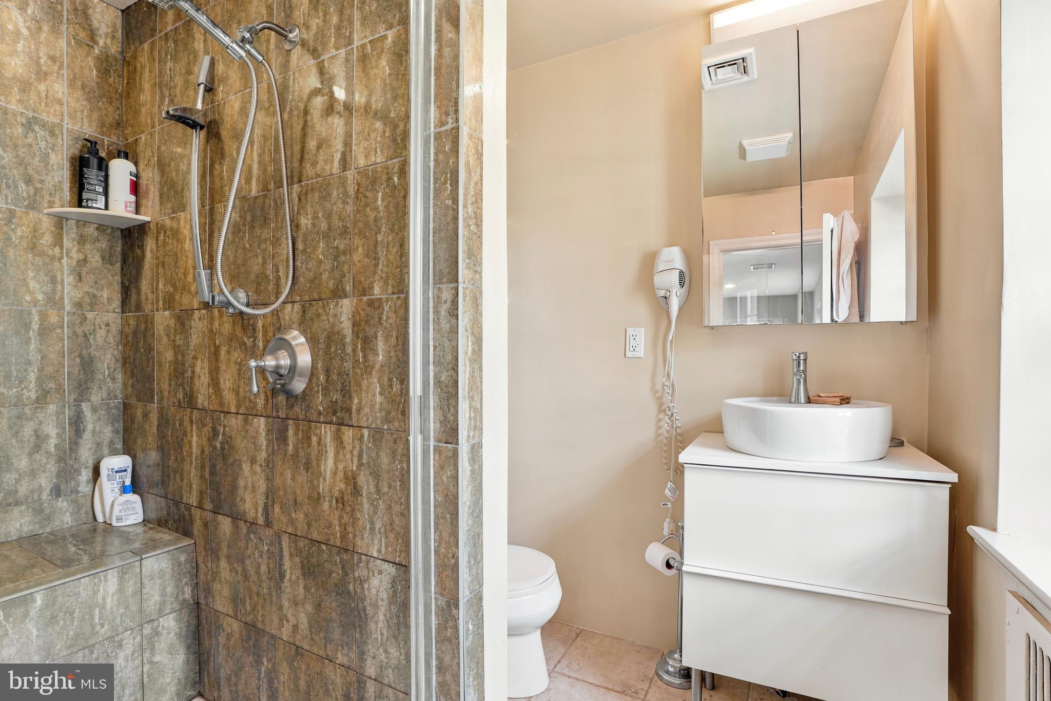 284 Trent Road Wynnewood, PA 19096 - Photo 13 of 31 a bathroom with a sink toilet and shower