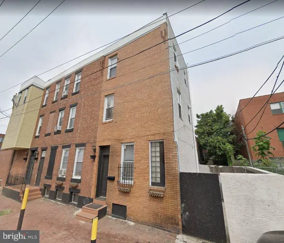 a front view of a building with street