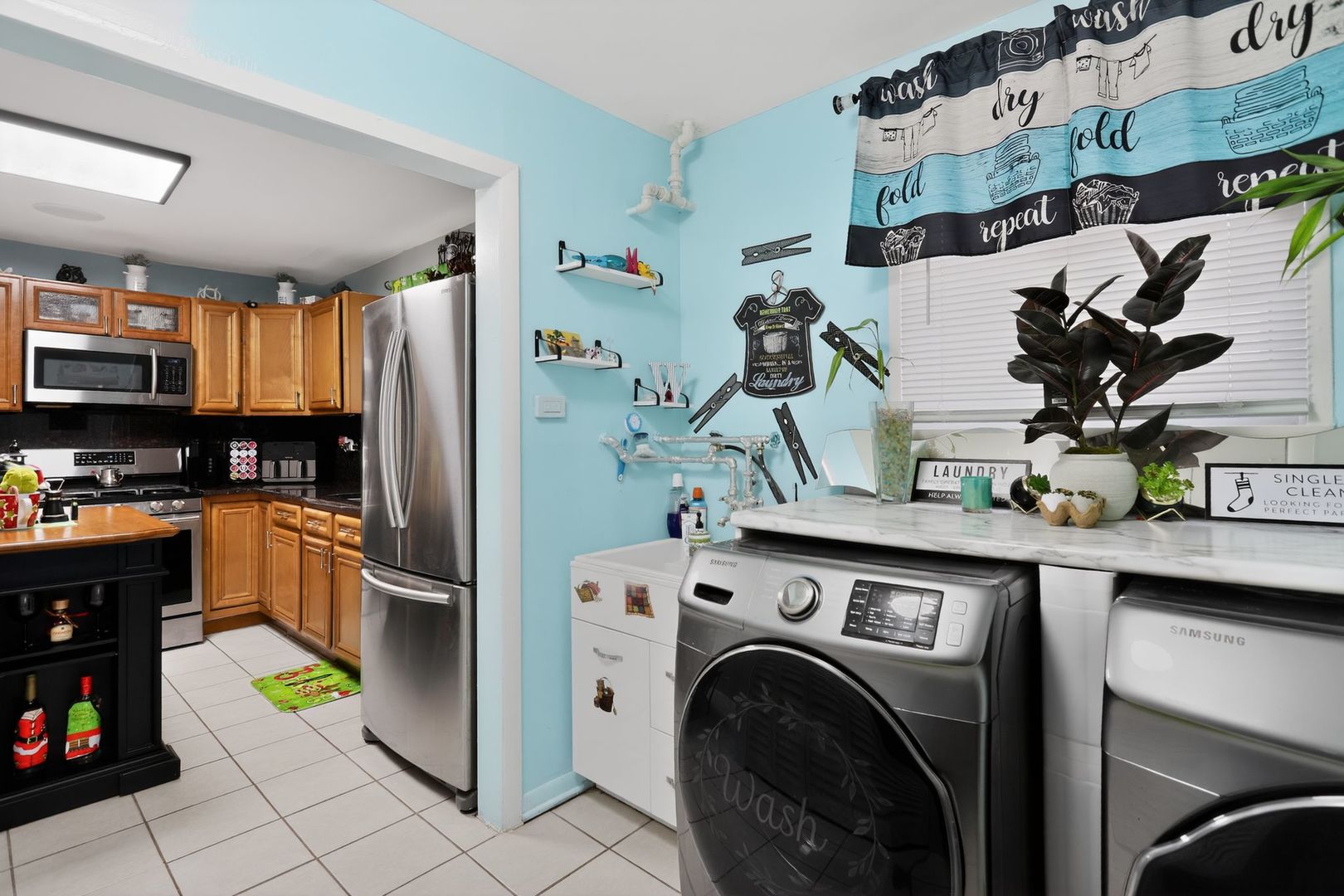 3446 West 74th Street Chicago, IL 60629 - Photo 18 of 30 a kitchen with stainless steel appliances granite countertop a refrigerator and a sink