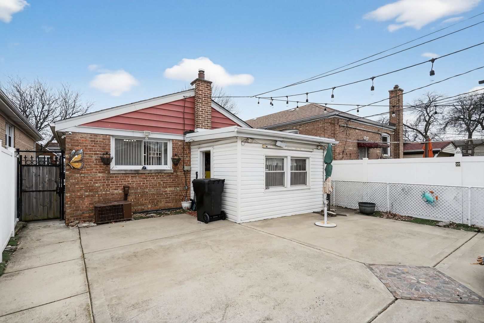 3446 West 74th Street Chicago, IL 60629 - Photo 24 of 30 a front view of a house with a garage