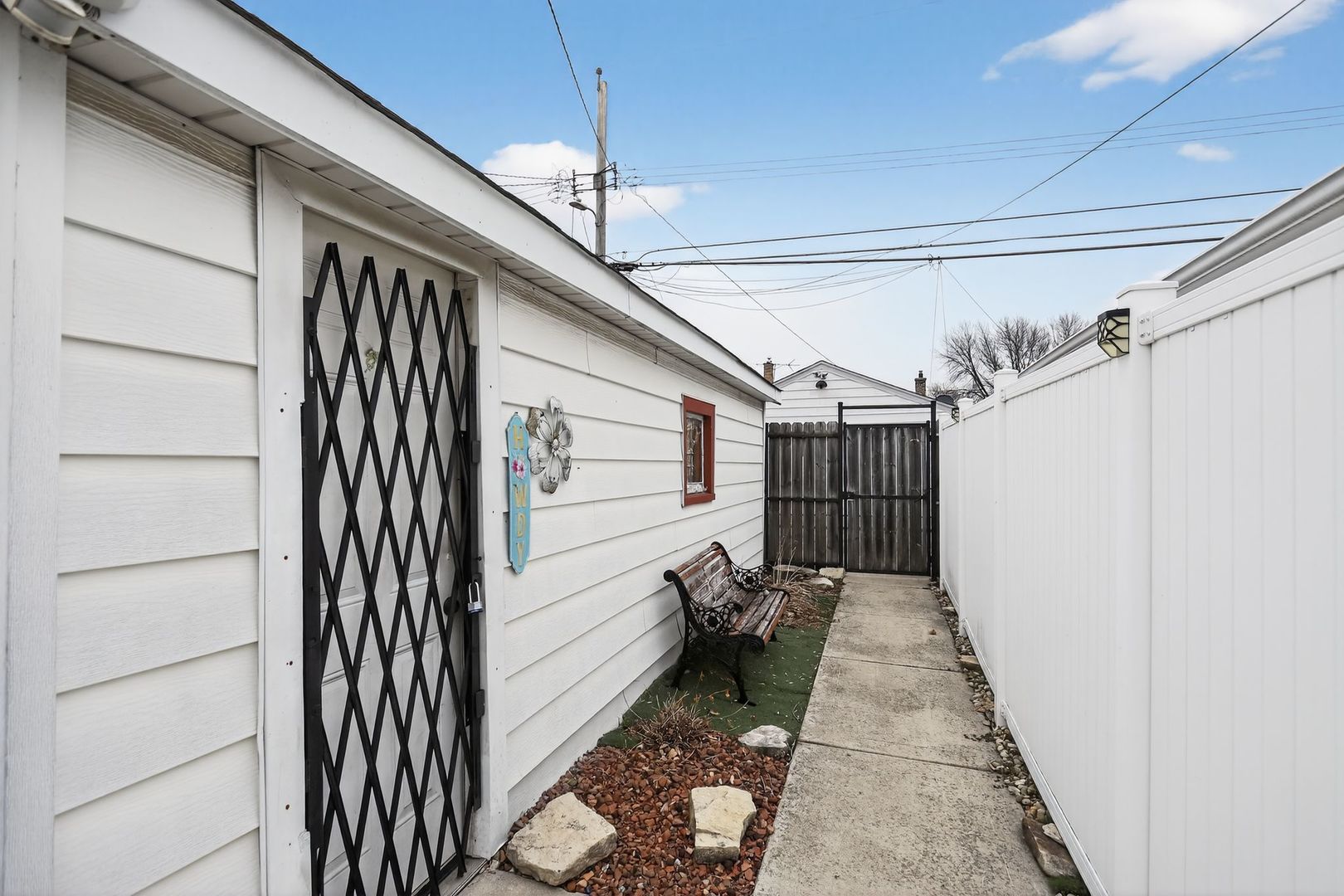 3446 West 74th Street Chicago, IL 60629 - Photo 27 of 30 a view of a hallway with wooden floor and staircase