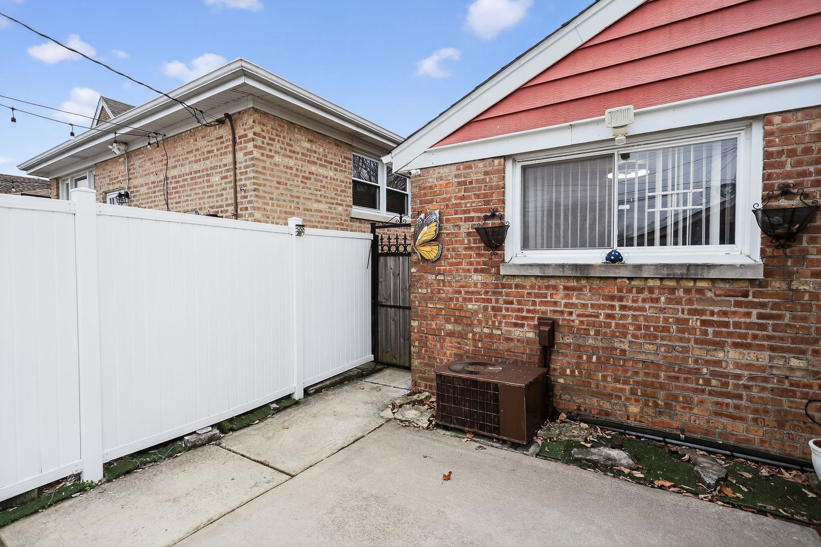 3446 West 74th Street Chicago, IL 60629 - Photo 3 of 30 a front view of a house with a garage