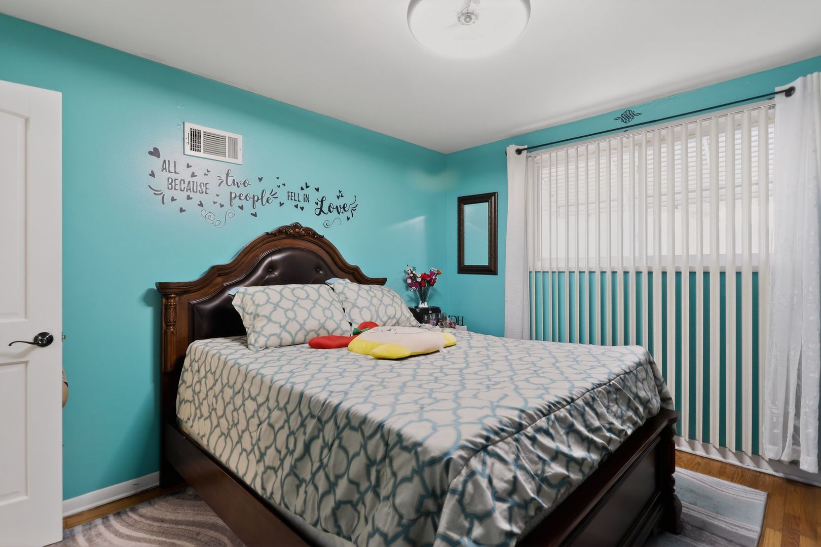 3446 West 74th Street Chicago, IL 60629 - Photo 10 of 30 a bedroom with a bed and a window