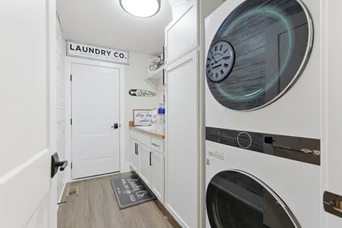 a view of a livingroom with furniture and a flat screen tv
