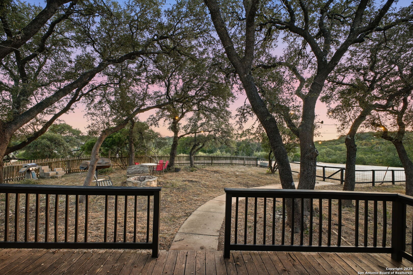 18668 Bandera Road Helotes, TX 78023 - Photo 15 of 52 a view of deck with trees