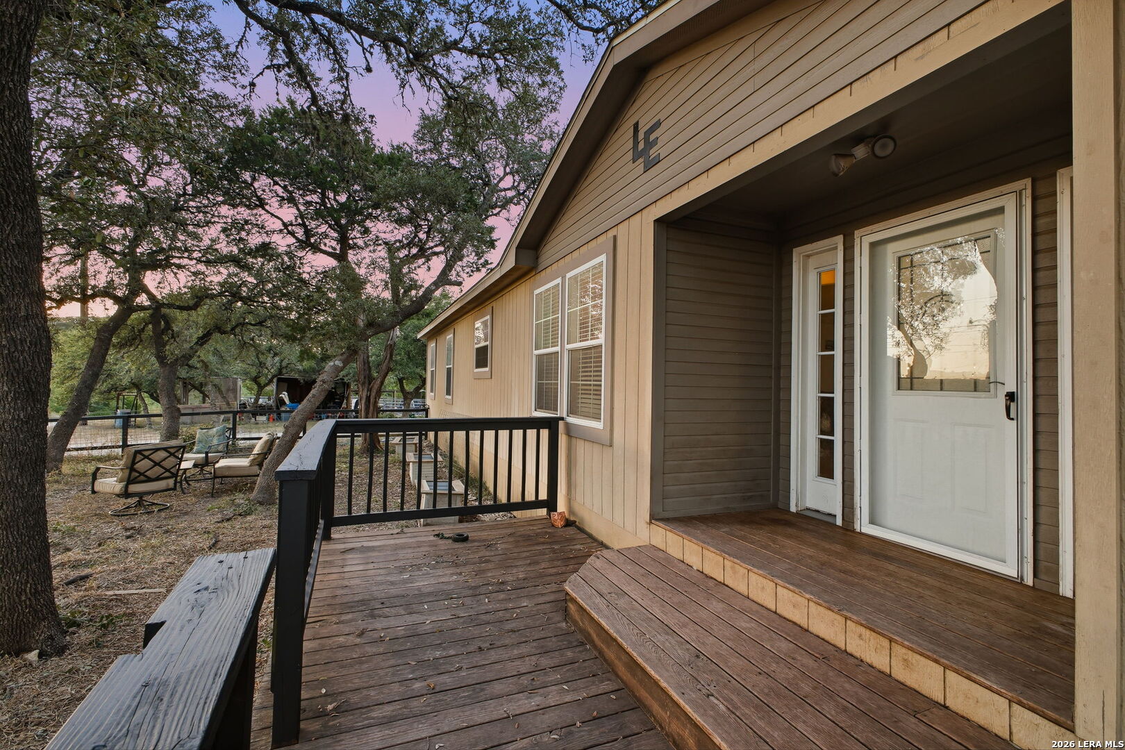 18668 Bandera Road Helotes, TX 78023 - Photo 18 of 52 a view of a wooden deck