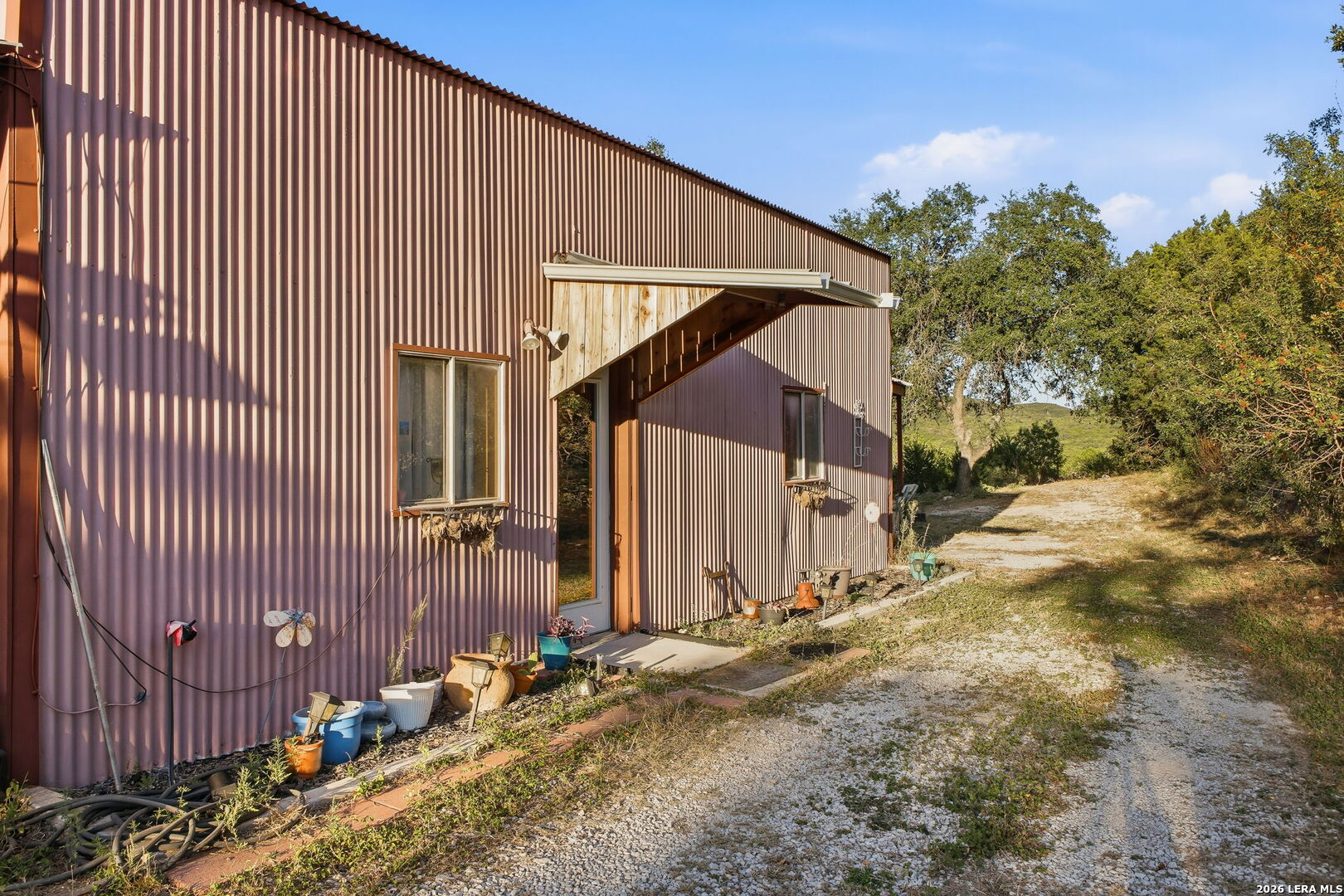 18668 Bandera Road Helotes, TX 78023 - Photo 25 of 52 a backyard of a house