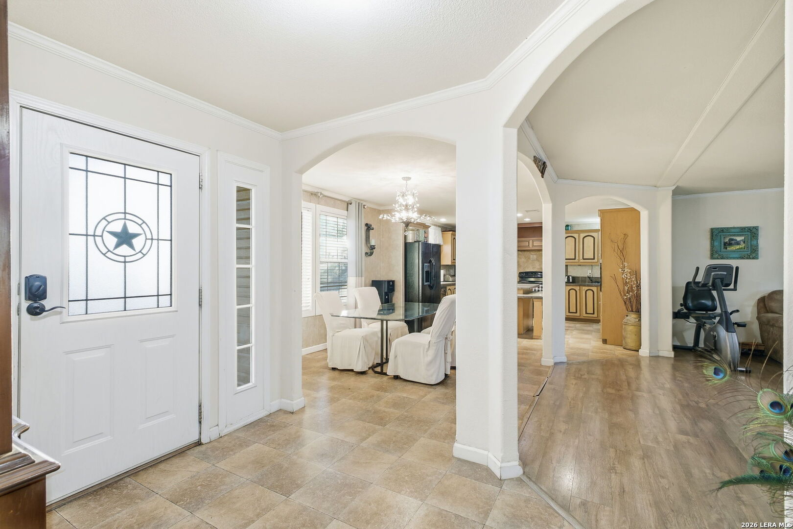 18668 Bandera Road Helotes, TX 78023 - Photo 29 of 52 a view of a livingroom with wooden floor and a refrigerator