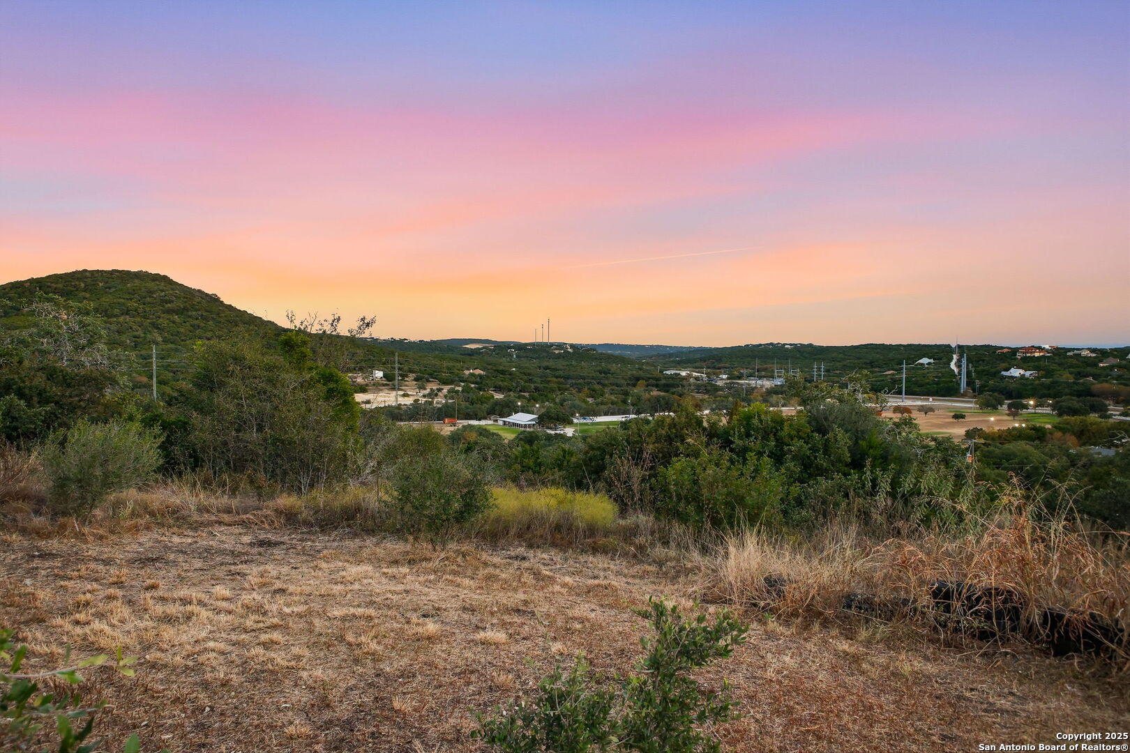 18668 Bandera Road Helotes, TX 78023 - Photo 9 of 52 a view of a lake in middle of forest