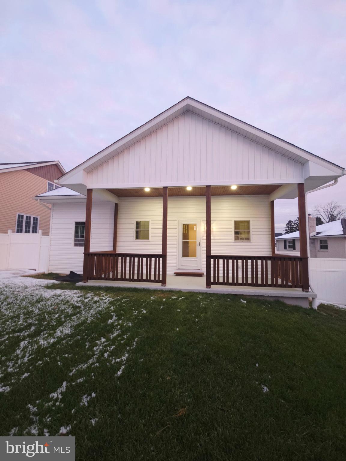1015 Chambers Street Harrisburg, PA 17113 - Photo 2 of 23 a view of a house with a yard