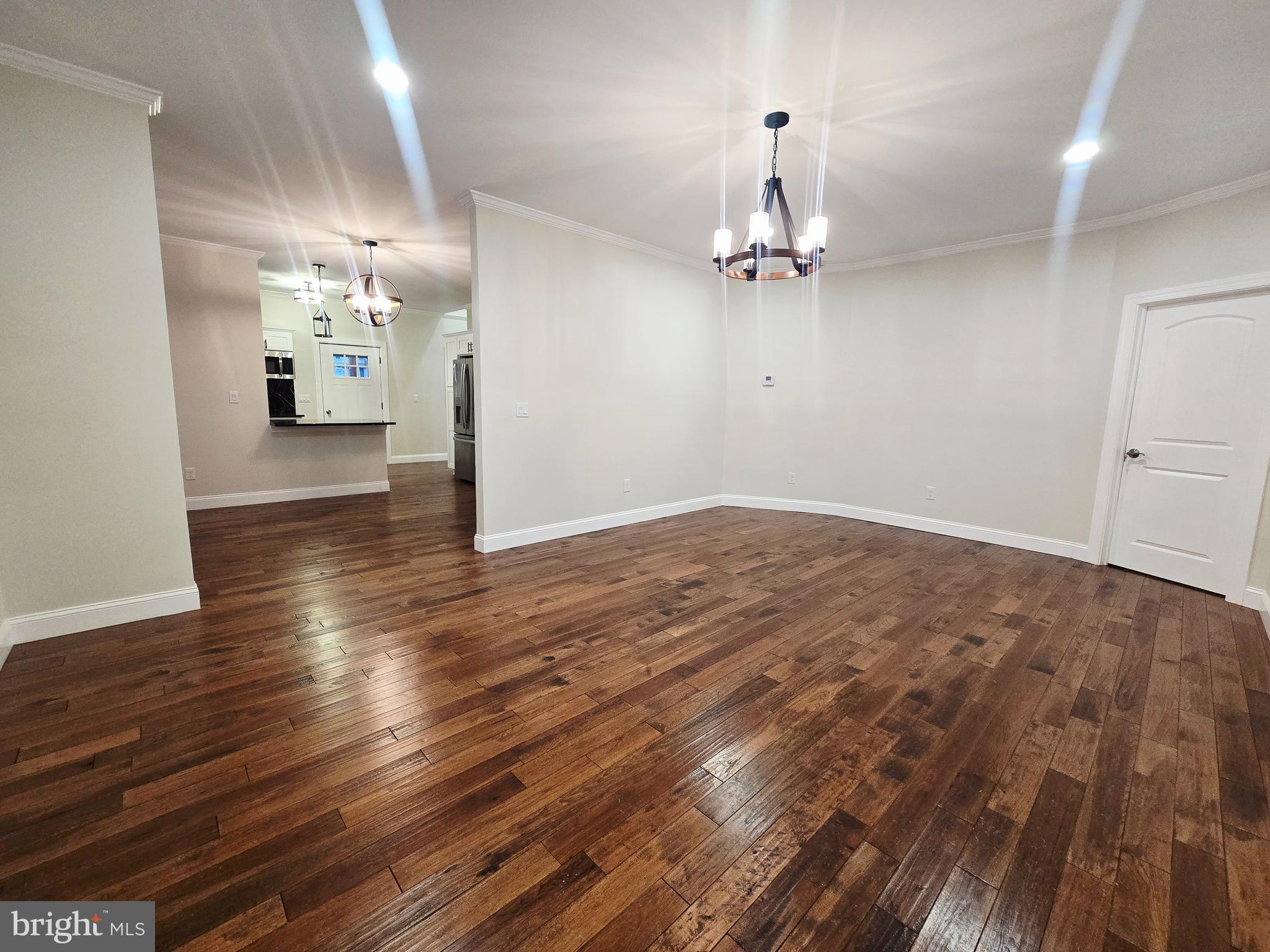 1015 Chambers Street Harrisburg, PA 17113 - Photo 4 of 23 wooden floor in an empty room with a window