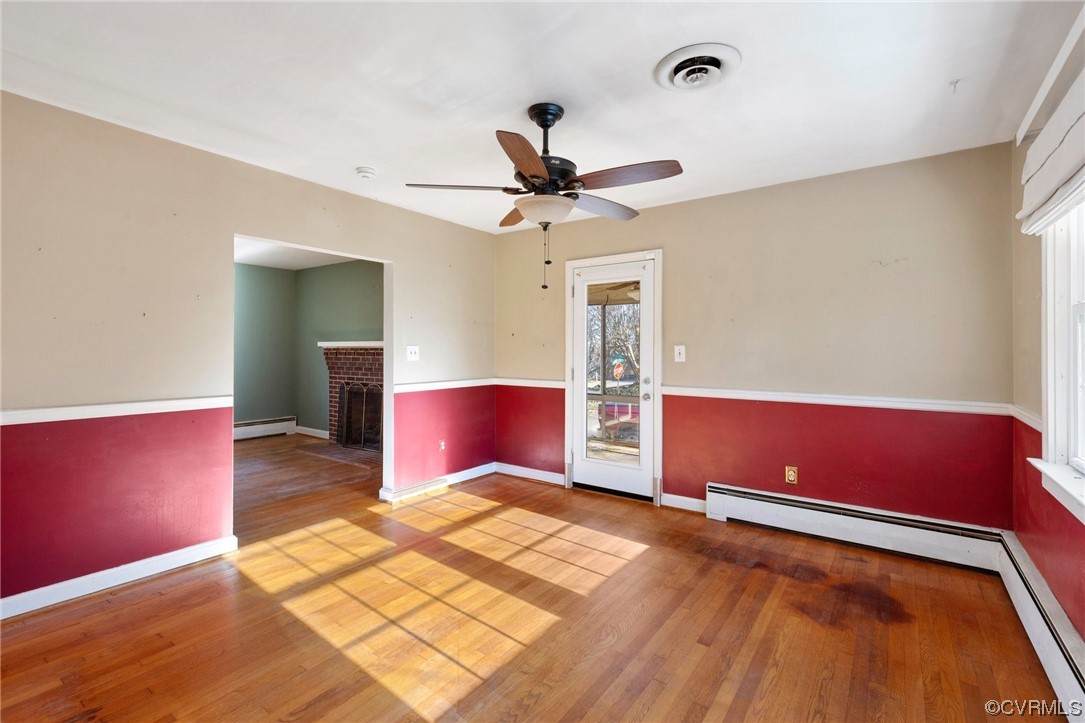 406 Riverside Avenue Hopewell, VA 23860 - Photo 12 of 38 a view of room with window and a ceiling fan
