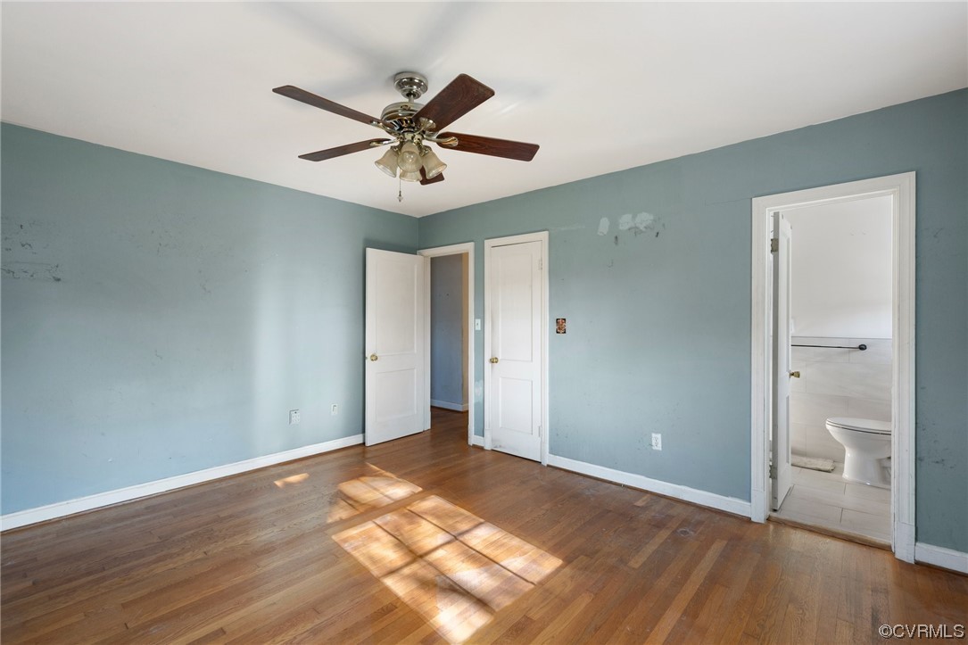 406 Riverside Avenue Hopewell, VA 23860 - Photo 17 of 38 a view of a big room with wooden floor and windows