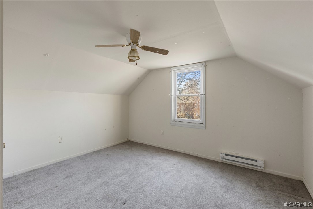 406 Riverside Avenue Hopewell, VA 23860 - Photo 26 of 38 an empty room with a ceiling fan and window